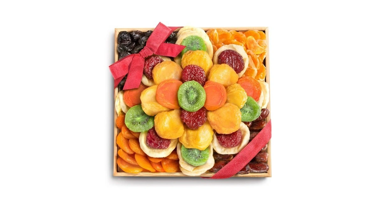 A Gift Inside Dried Fruit Gift Basket In Wooden Serving